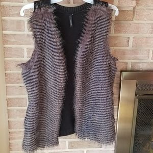 Black and gray fur vest
